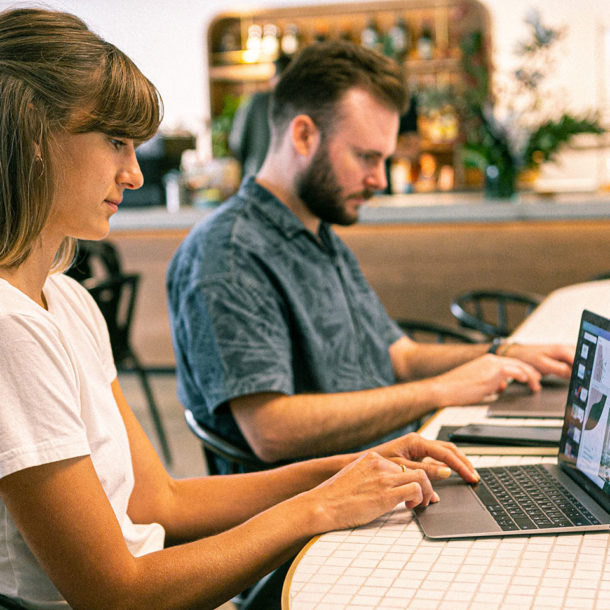 digital marketing agency experts with laptops working in the office