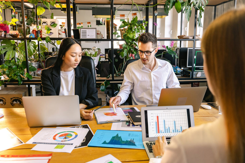 marketing automation consultant office employees analysing the financial reviews