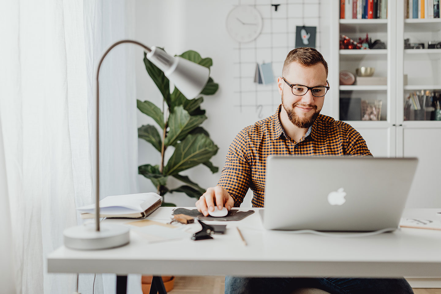 a developer at the macbook in the office