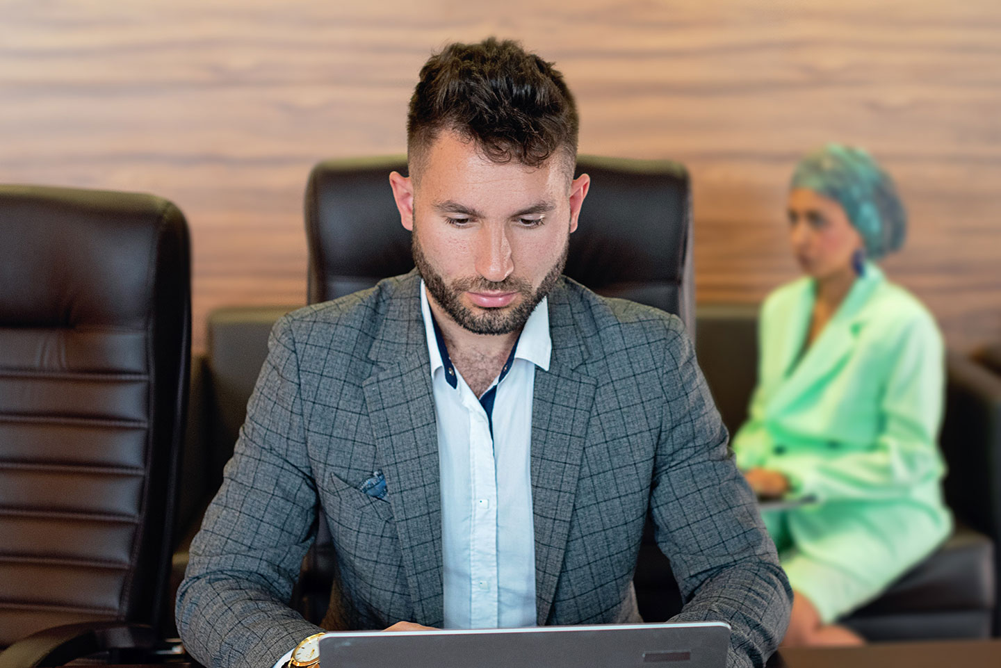 man in his office with laptop