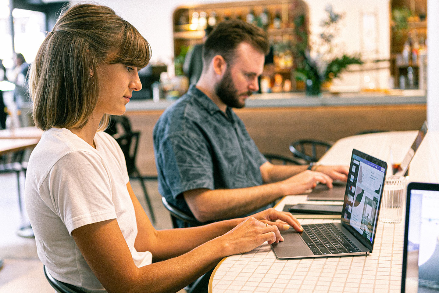 digital marketing agency experts with laptops working in the office